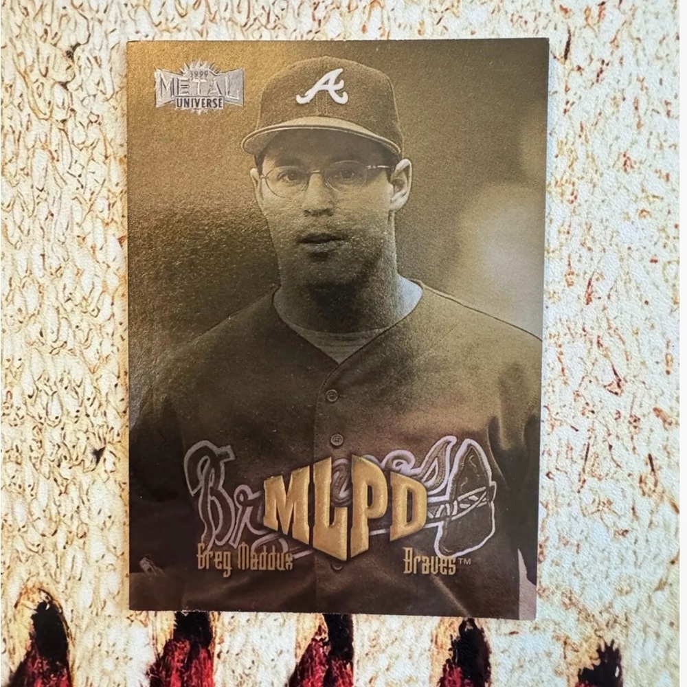 1999 Skybox Metal Universe-Greg Maddux W/The Atlanta Braves Near Mint Or Better.